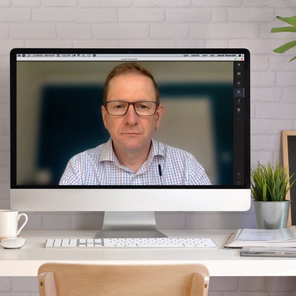 Dyfrig Jenkins on a Apple Mac screen providing a virtual coaching session.